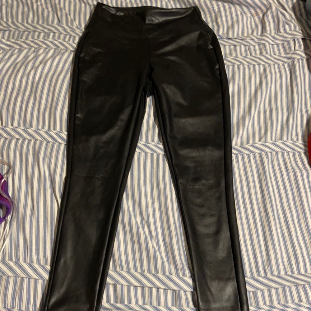 Size small bought at a boutique. Never worn